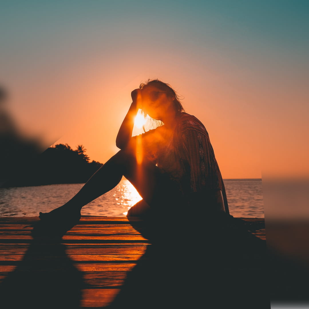 Silhouette on the beach during sunset 